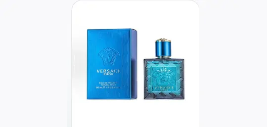 Boxed blue fragrance bottle standing next to its carton